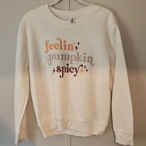 Women's Cream Sweater with Festive Text Design